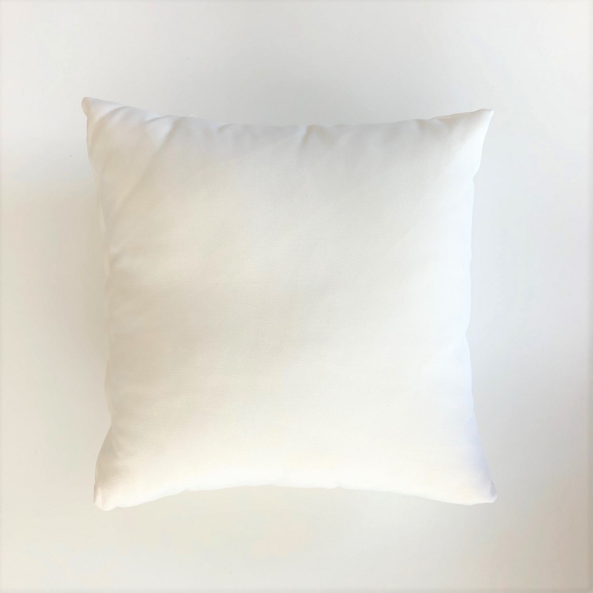 Location de coussin déco couleur unie écru à Paris